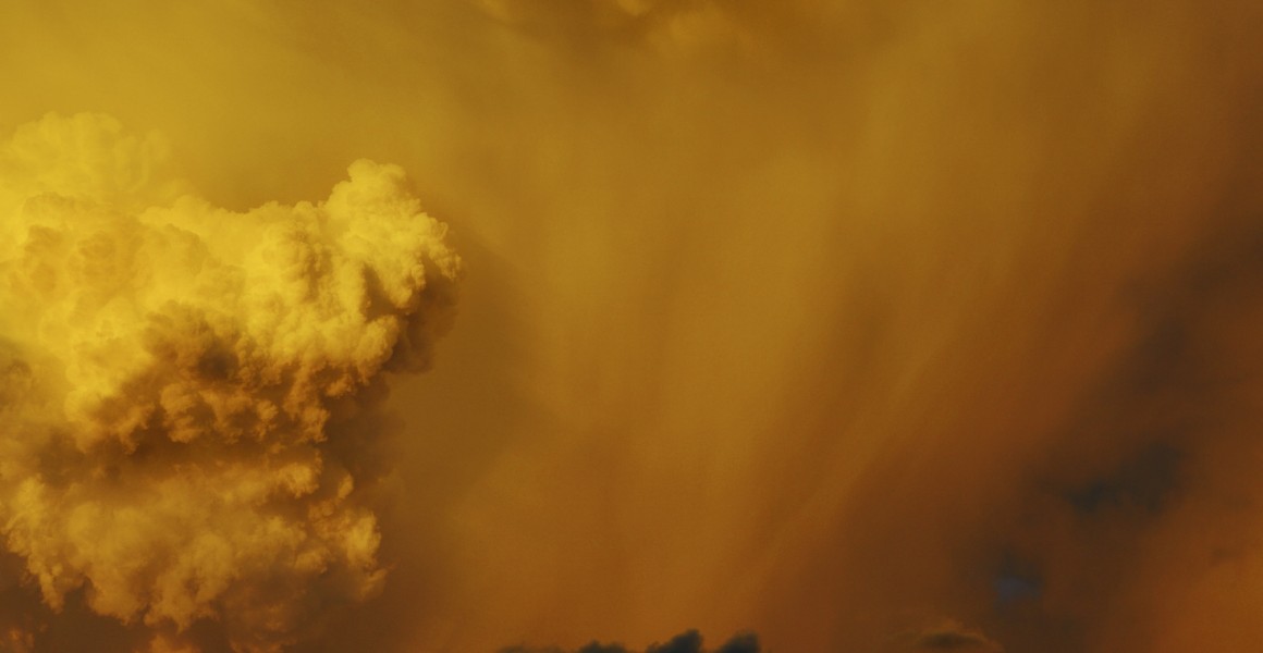 Art Print Australian Landscape in a Summer afternoon with orange and yellow clouds.