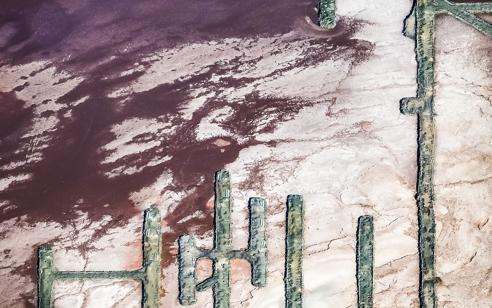 A Vertical Abstract Aerial photo of Australian Landscape in Pink, Purple and Red