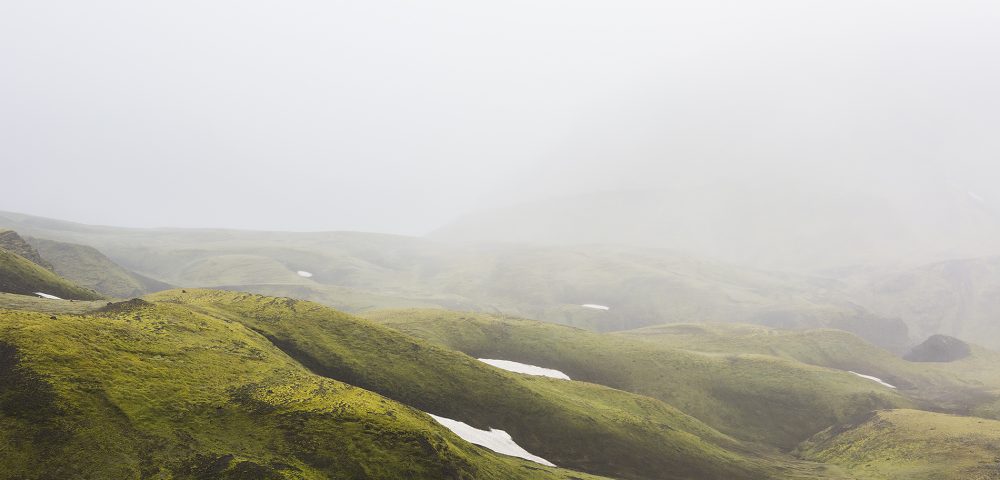 Misty Green Iclandic landscape of mountains and snow