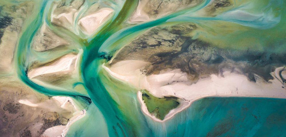 A Abstract Aerial Landscape of water in blue and green