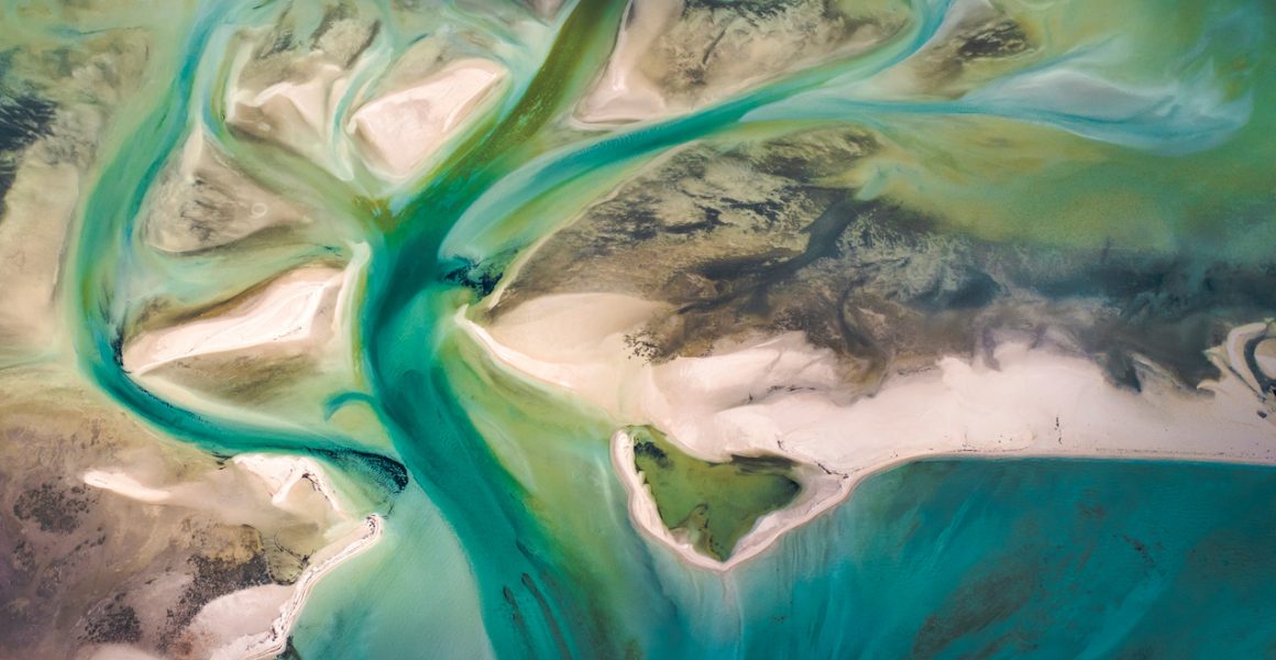 A Abstract Aerial Landscape of water in blue and green