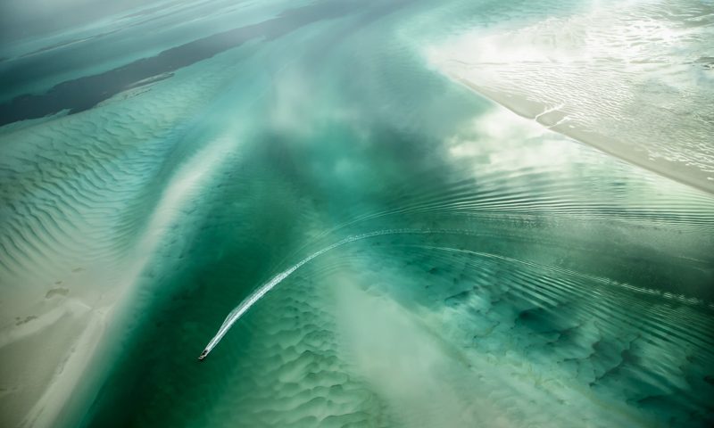 An Abstract Aerial Landscape photograph of water in green and white